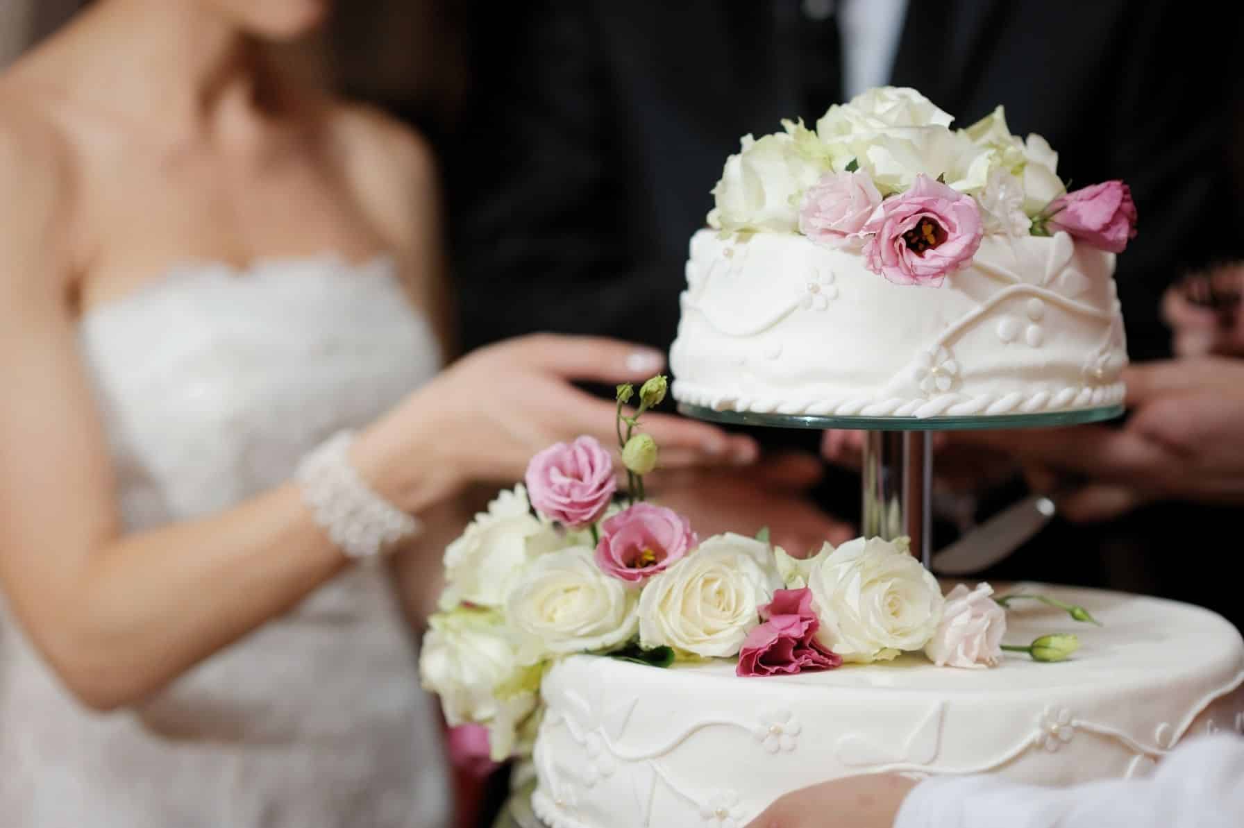 wedding cake cost with rose topping