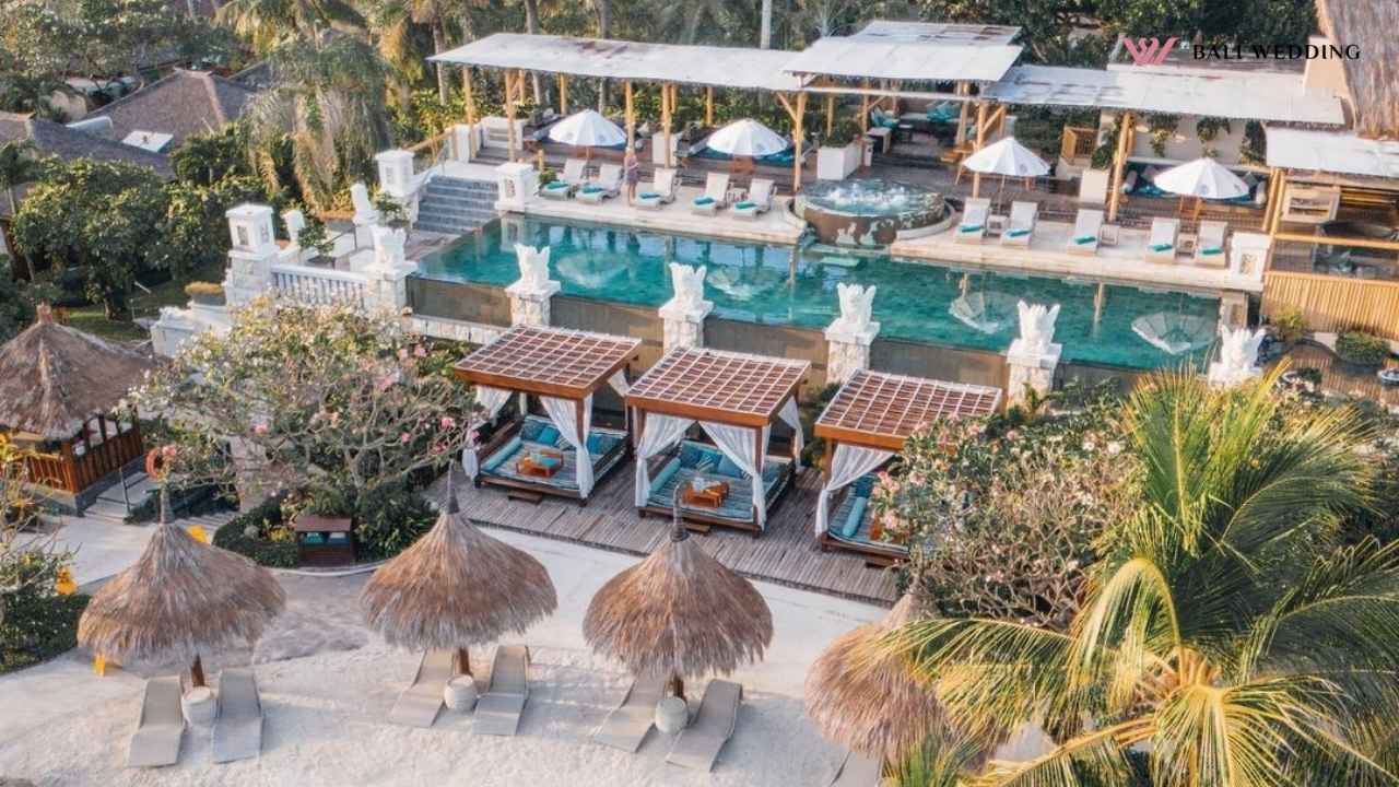 Beachfront wedding resort view with pool and gazebos in bali