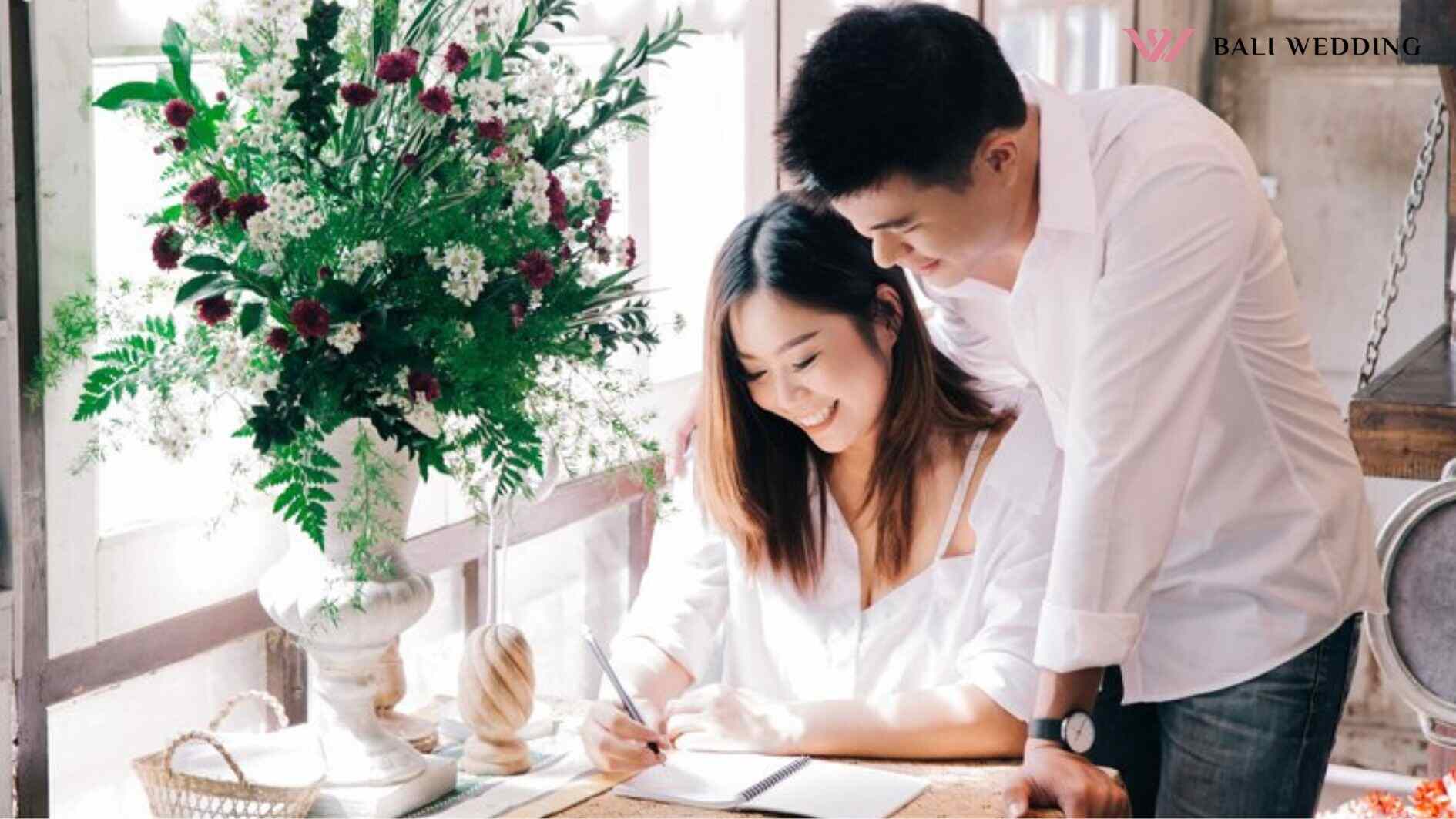 Asian couple sitting in a restaurant planning