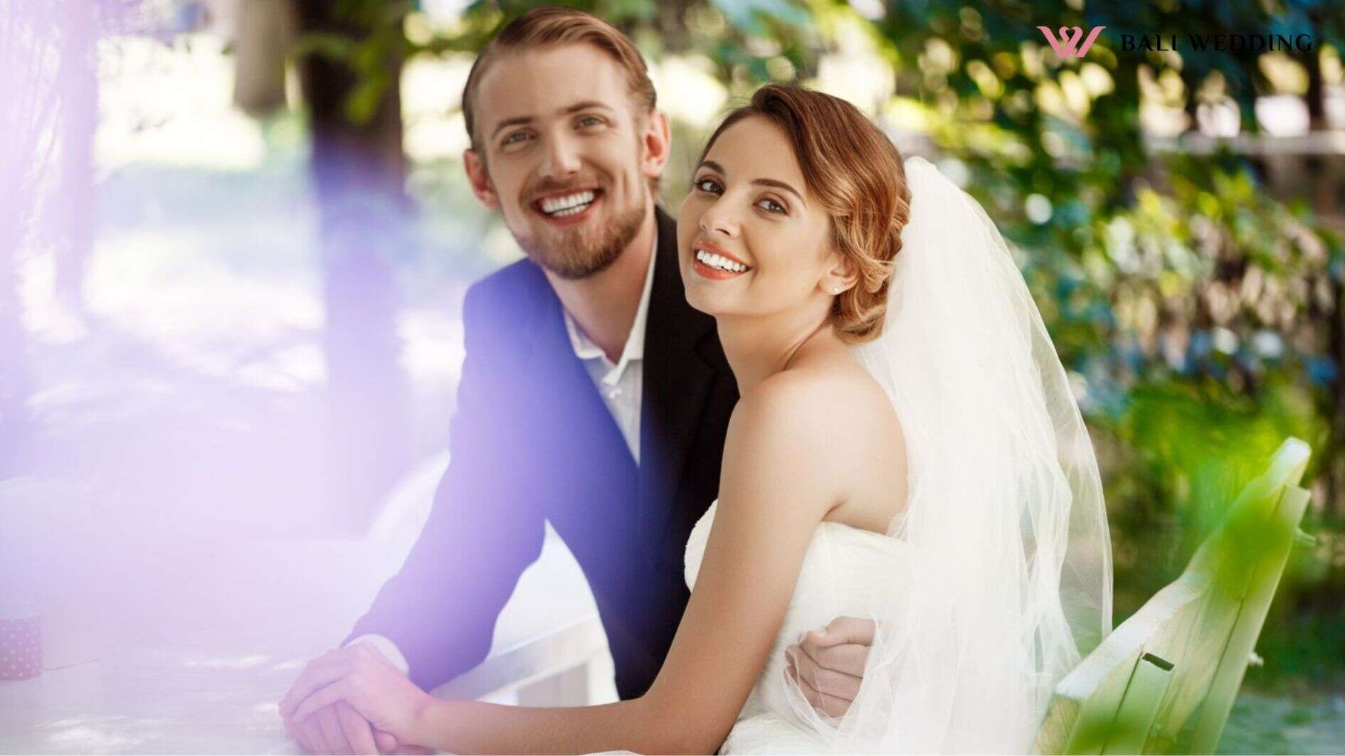 Young beautiful newlyweds smiling