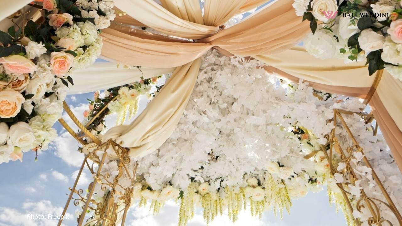 Clothes twined under the top of wedding altar