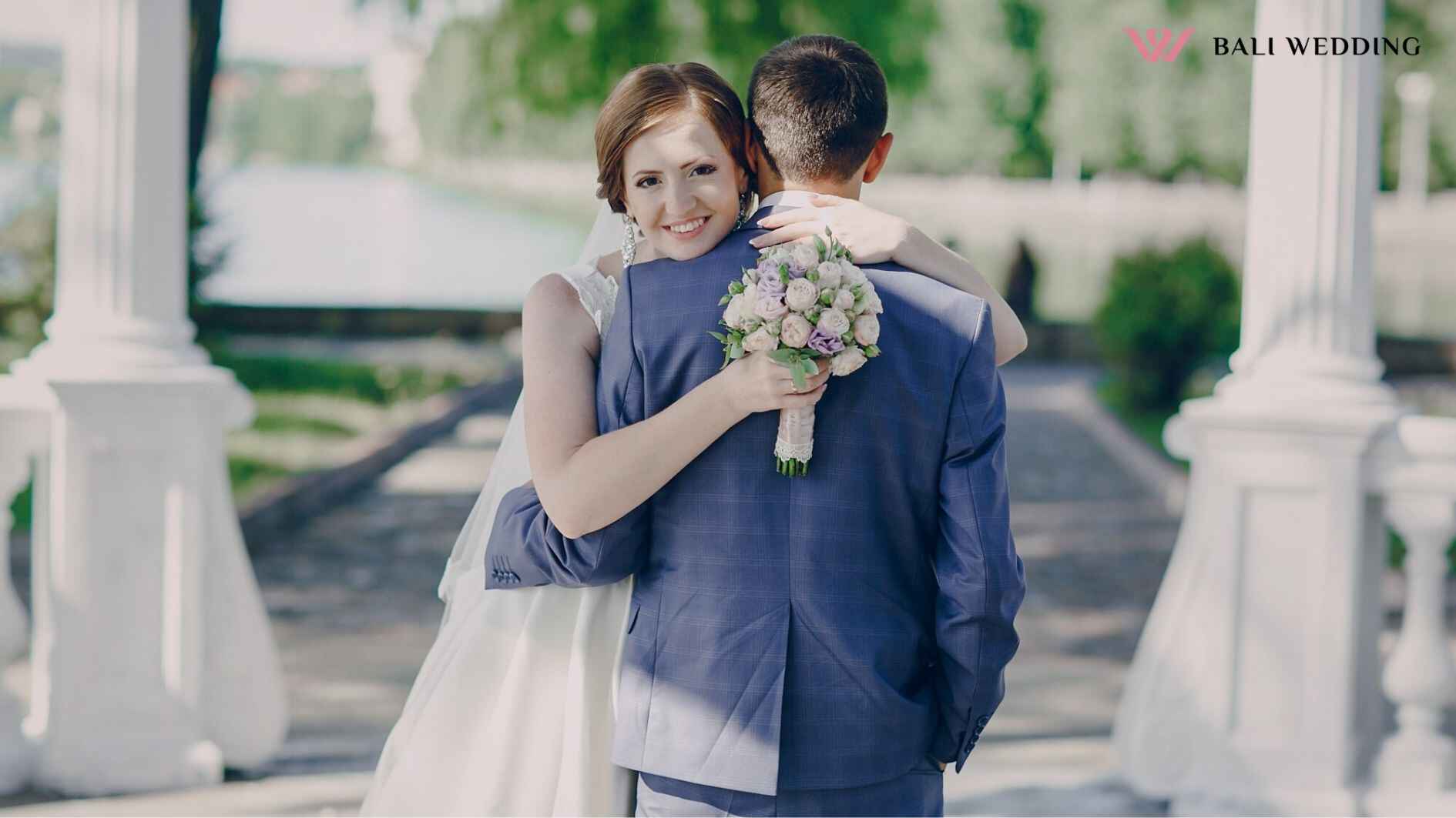 Happy bride hugging her groom