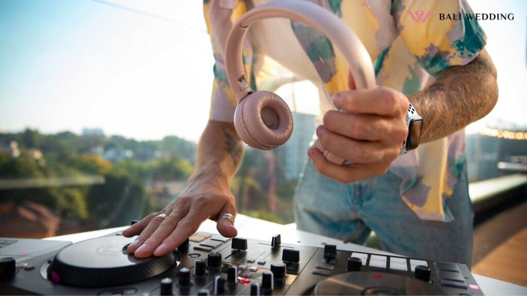 Side view dj holding headphones
