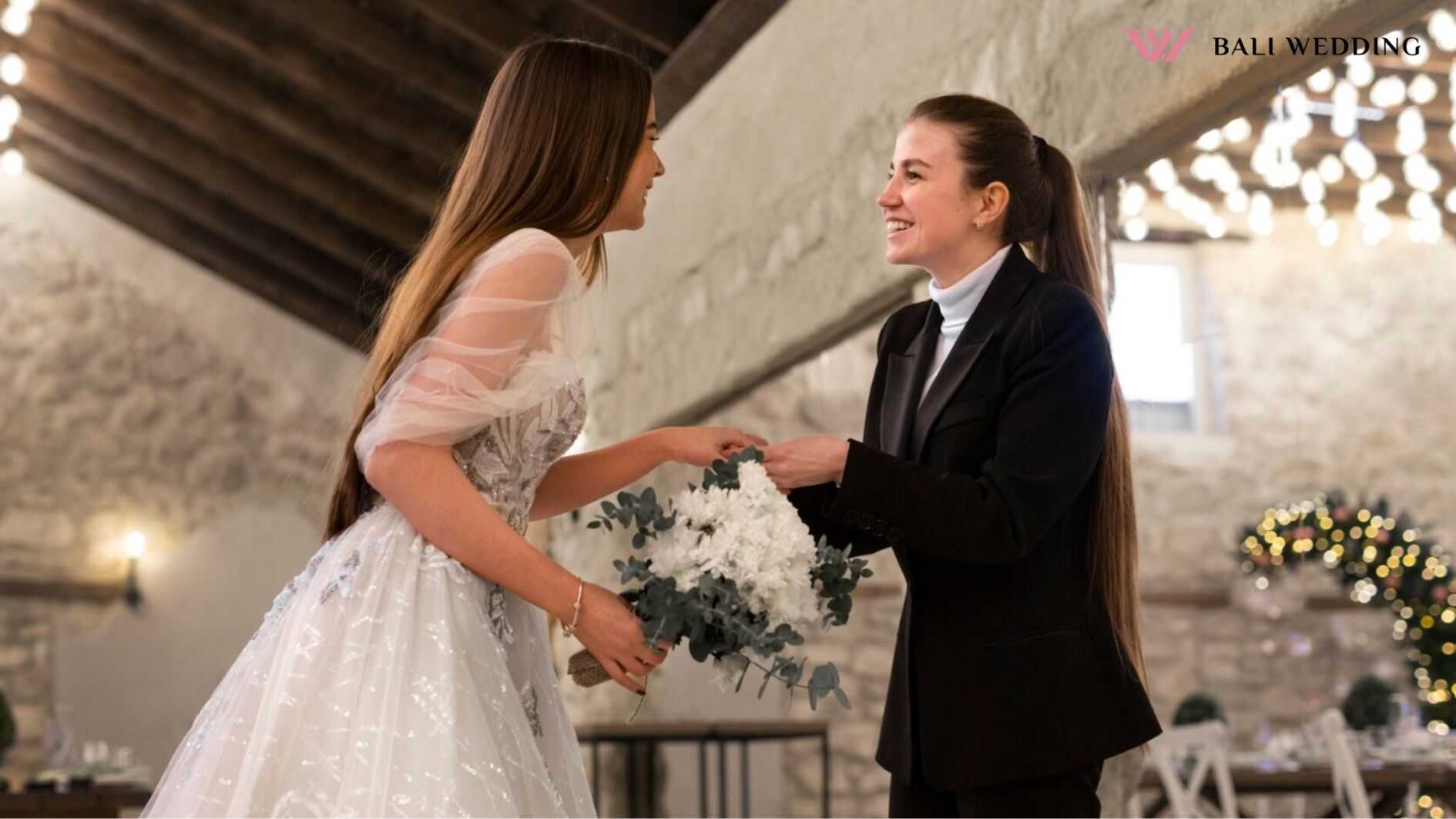 Female wedding planner working with bride