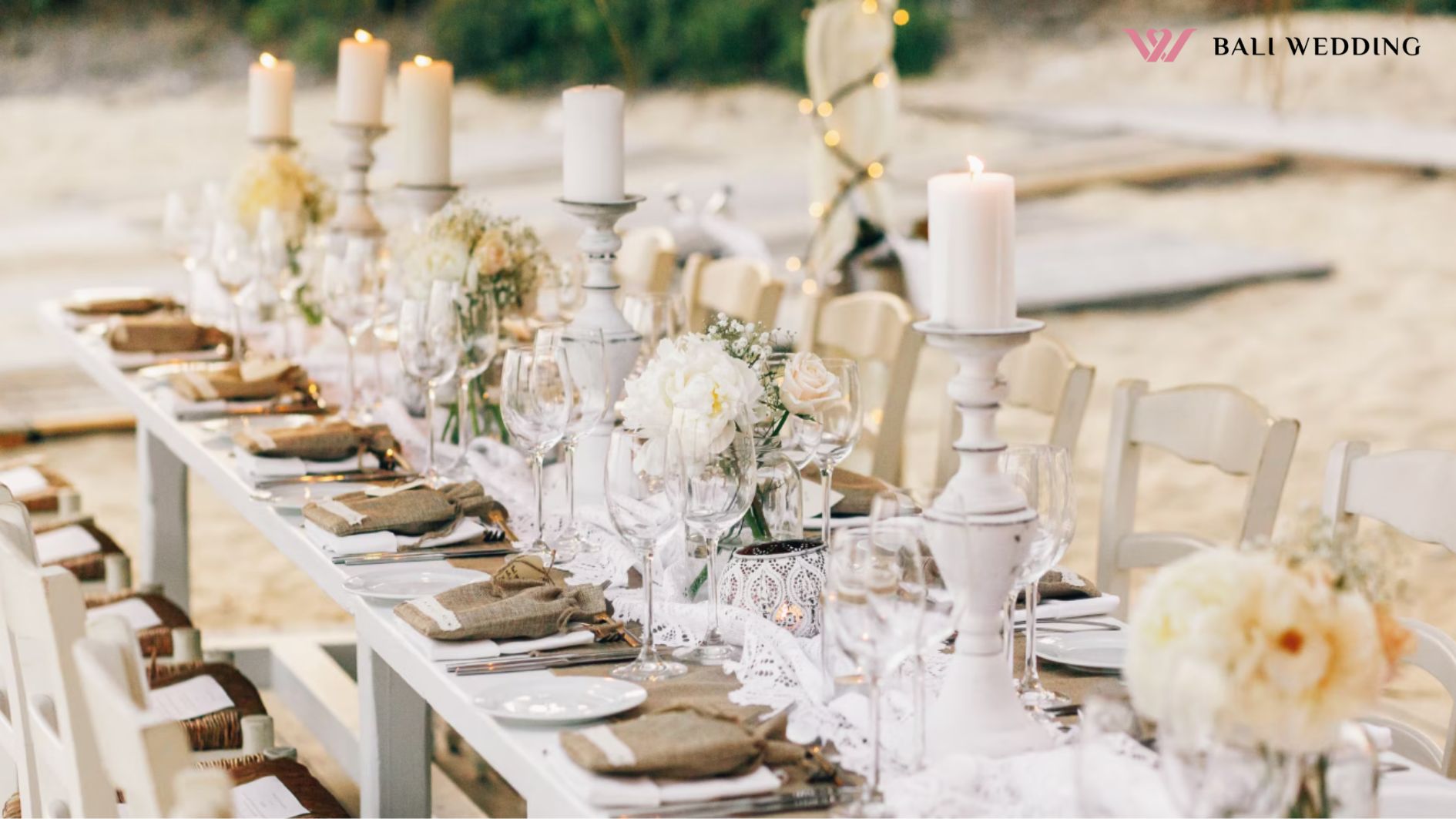 dekorasi pernikahan, Long dinner table decorated with flaxen cloth and white candles