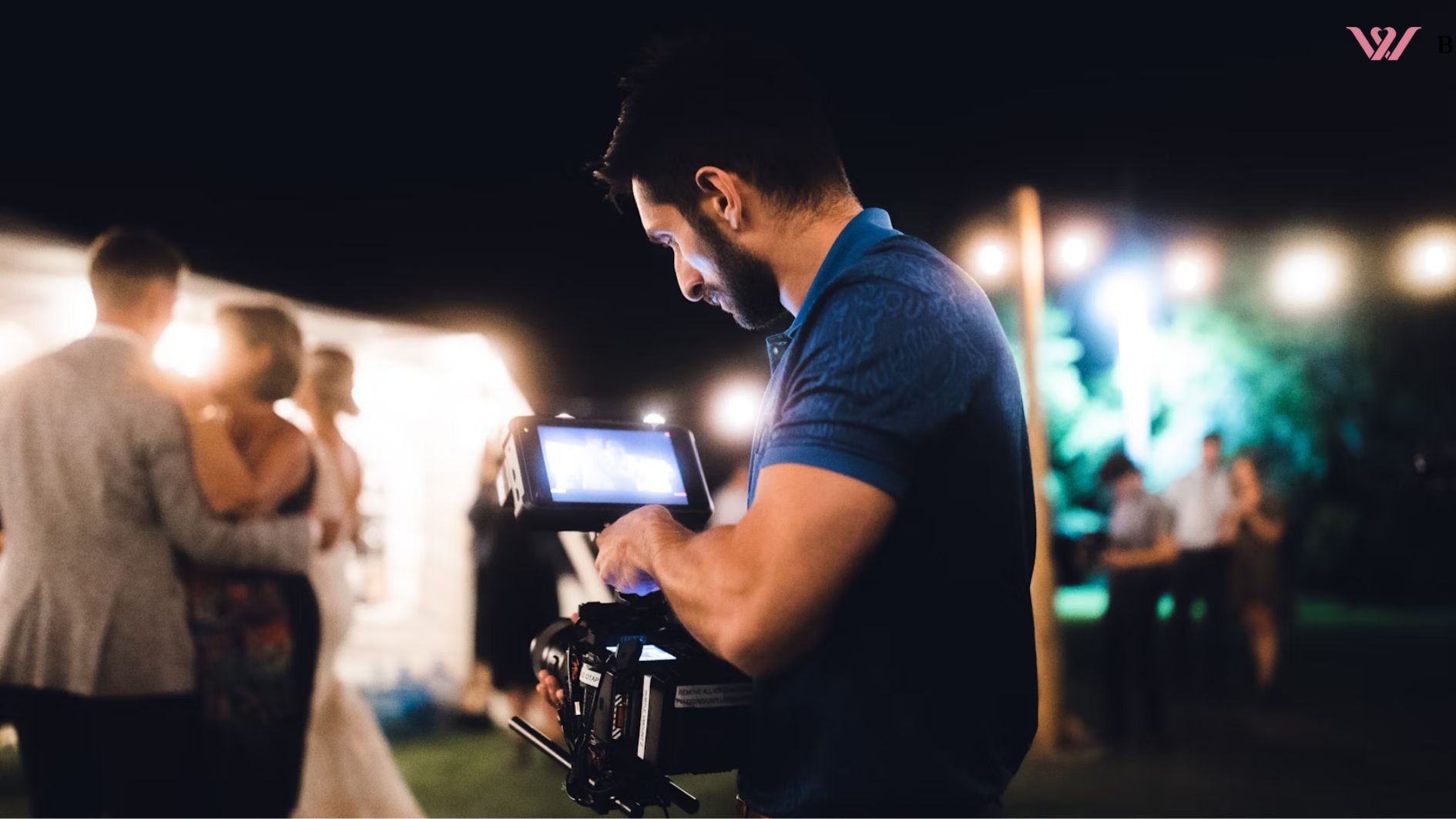 videografer Bali, a man standing next to a woman holding camera