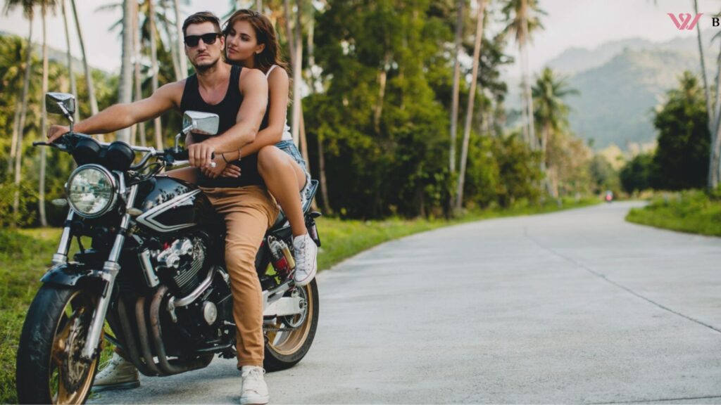 Young couple in love, riding a motorcycle